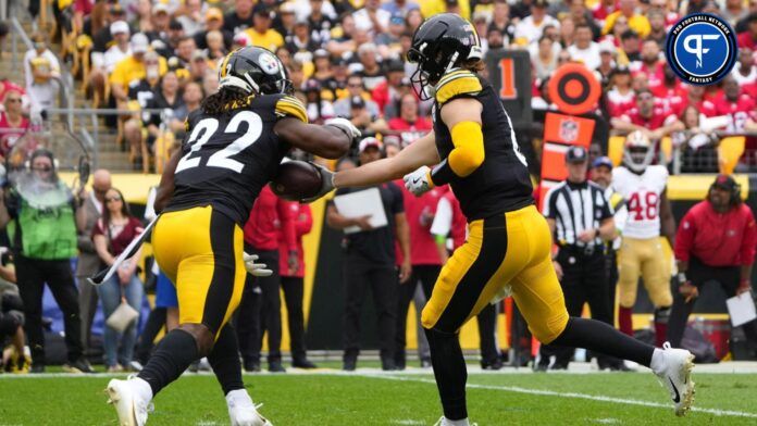 Kenny Pickett (8) hands the ball off to Pittsburgh Steelers running back Najee Harris (22) during the first half against the San Francisco 49ers at Acrisure Stadium.