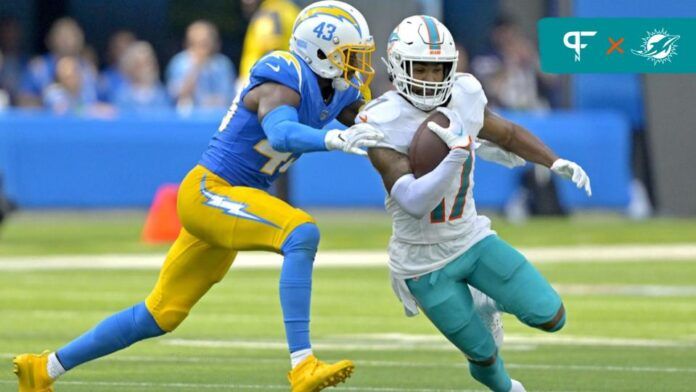 Miami Dolphins WR Jaylen Waddle runs with the football.