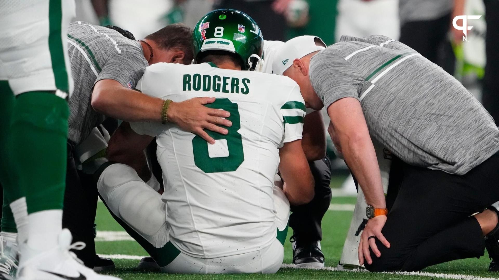 Aaron Rodgers (8) is injured after a sack by Buffalo Bills defensive end Leonard Floyd (not pictured) during the first quarter at MetLife Stadium.