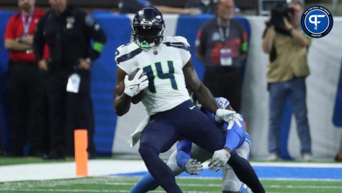 Seattle Seahawks wide receiver DK Metcalf makes a catch against Detroit Lions cornerback Jerry Jacobs during the first half at Ford Field, Sunday, Sept. 17, 2023.