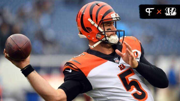 AJ McCarron (5) warms up before a game against the Tennessee Titans at Nissan Stadium.