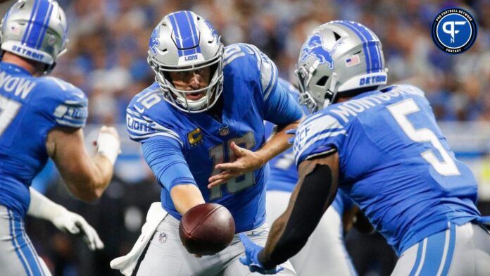 Detroit Lions quarterback Jared Goff (16) hands the ball to running back David Montgomery (5) against Seattle Seahawks during the first half at Ford Field.