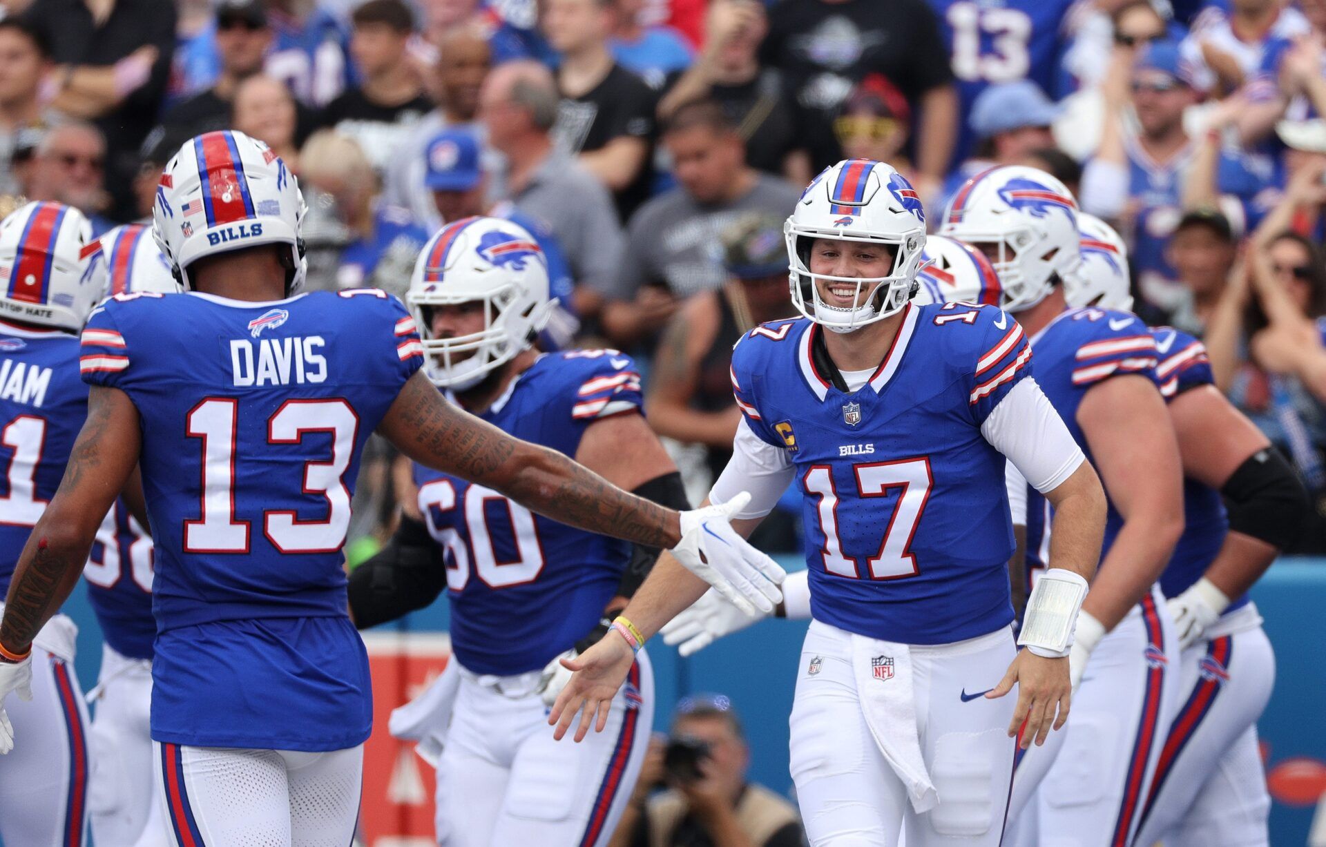 Josh Allen celebrates a touchdown in a 38-10 win over the Raiders.
