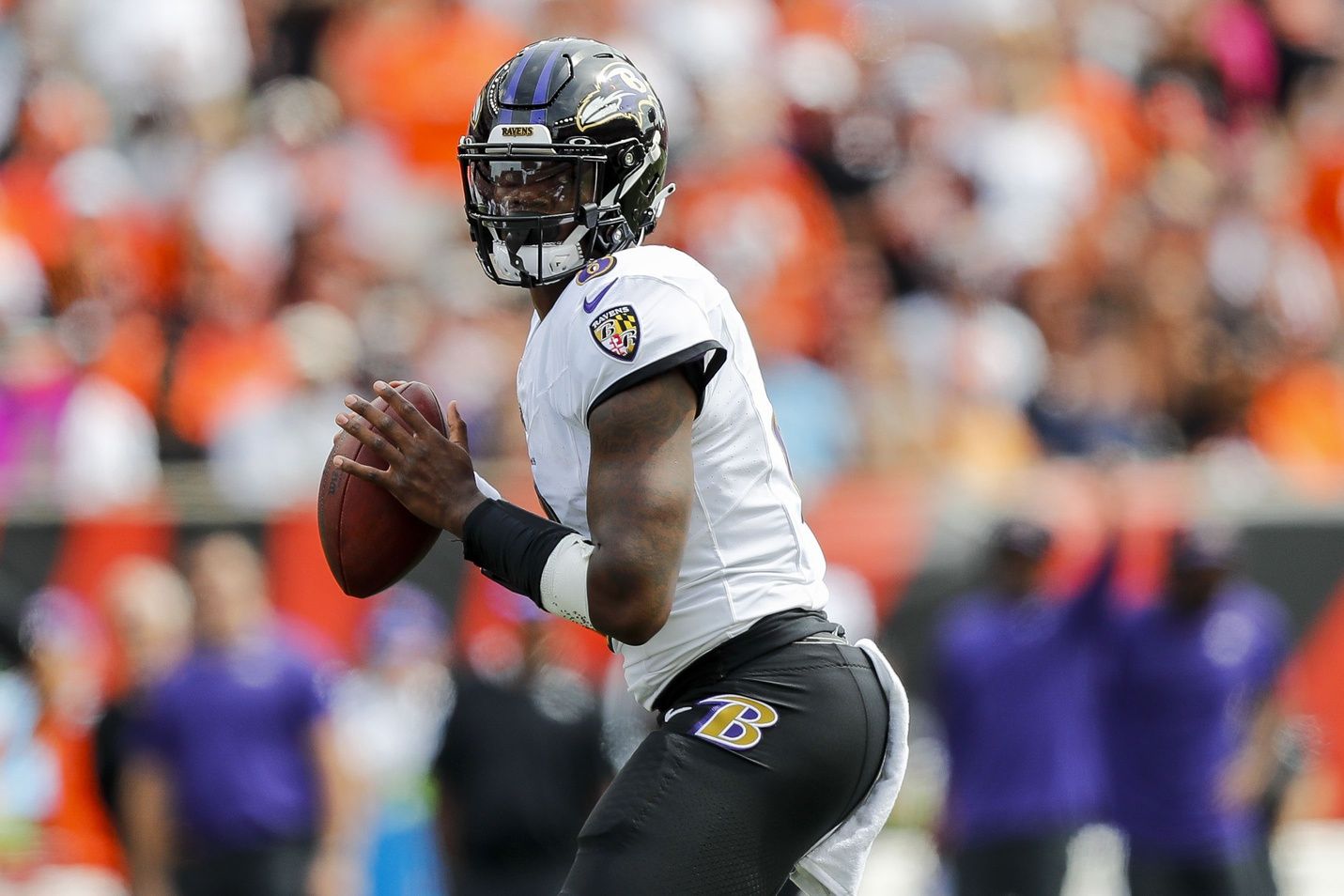 Lamar Jackson (8) plays the field against the Cincinnati Bengals in the first half at Paycor Stadium.