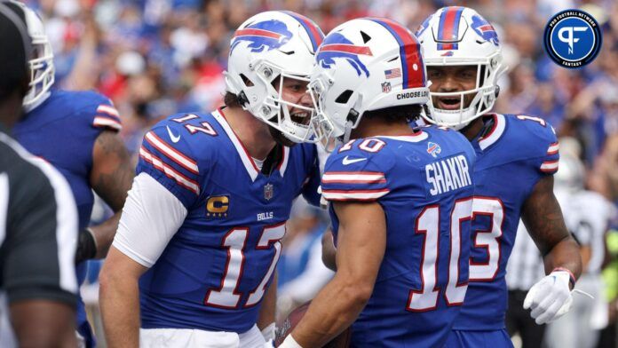 Bills quarterback Josh Allen congratulates receiver Khalil Shakir on his touchdown catch.