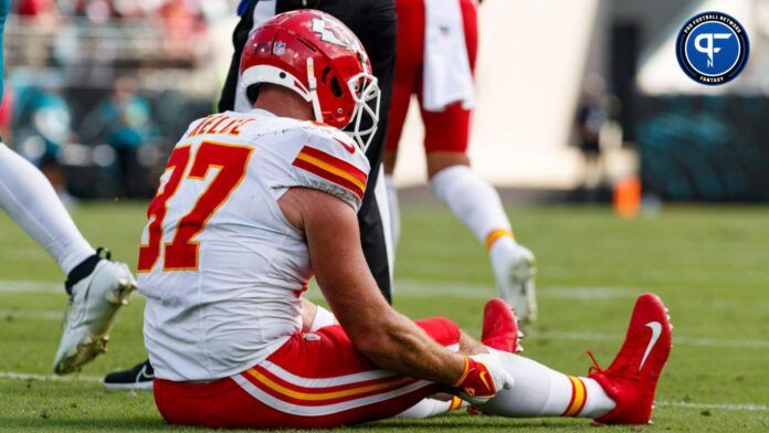 Kansas City Chiefs tight end Travis Kelce (87) sits after a play against Jacksonville Jaguars during the fourth quarter at EverBank Stadium.