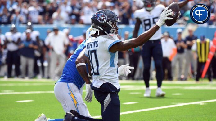 Tennessee Titans wide receiver DeAndre Hopkins (10) celebrates after a catch for a first down during the second half against the Los Angeles Chargers at Nissan Stadium.