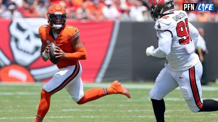 Chicago Bears QB Justin Fields (1) rolls out versus the Tampa Bay Buccaneers.