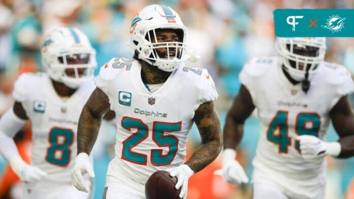 Xavien Howard (25) scores a touchdown after recovering a fumble during the second quarter against the Houston Texans at Hard Rock Stadium.