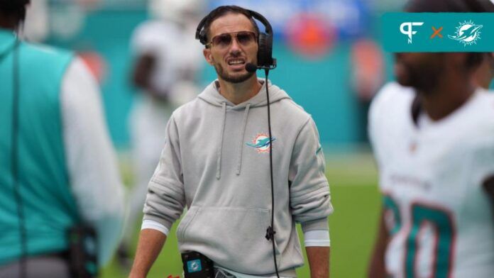 Mike McDaniel walks the sidelines during the second half of an NFL game against the Denver Broncos at Hard Rock Stadium in Miami Gardens.