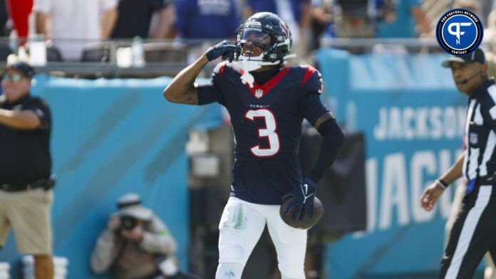 Tank Dell (3) celebrates a touchdown against the Jacksonville Jaguars during the fourth quarter at EverBank Stadium.