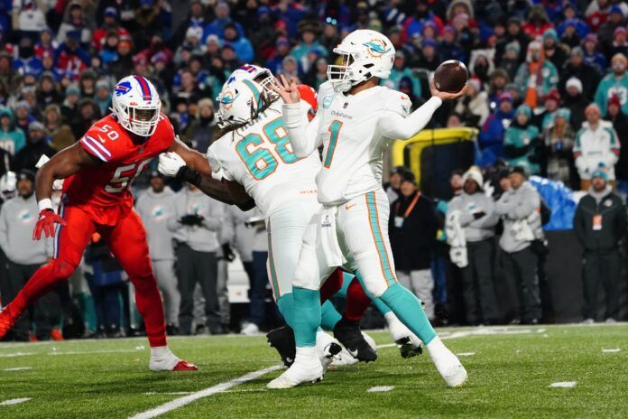 Miami Dolphins QB Tua Tagovailoa (1) throws a pass against the Buffalo Bills.