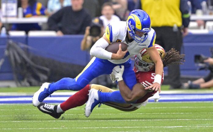 Los Angeles Rams quarterback Matthew Stafford tackled by the San Francisco 49ers in Week 2.