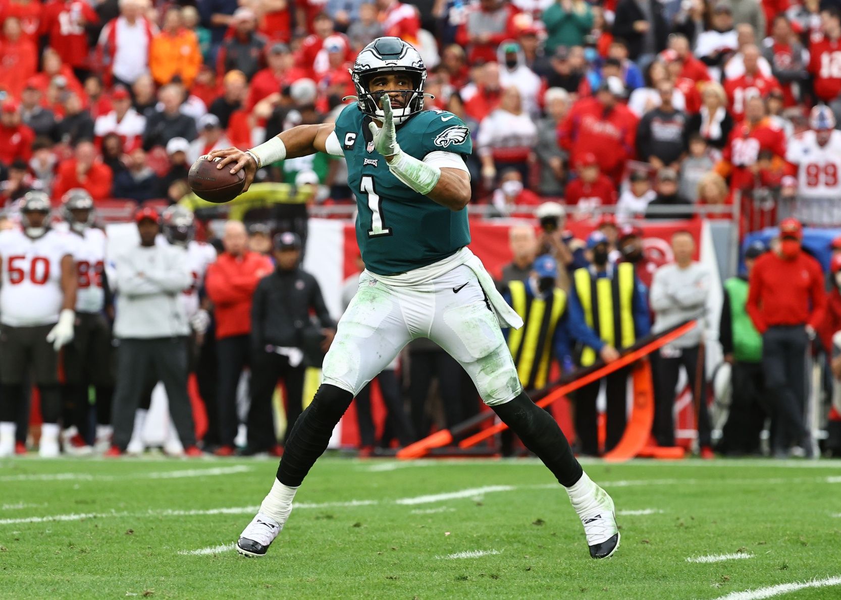 Jalen Hurts (1) throws the ball against the Tampa Bay Buccaneers during the second half in a NFC Wild Card playoff football game at Raymond James Stadium.