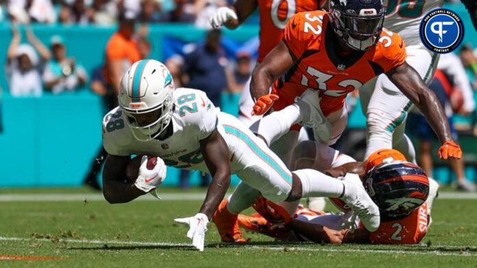 De'Von Achane (28) scores a touchdown against the Denver Broncos in the second quarter at Hard Rock Stadium.