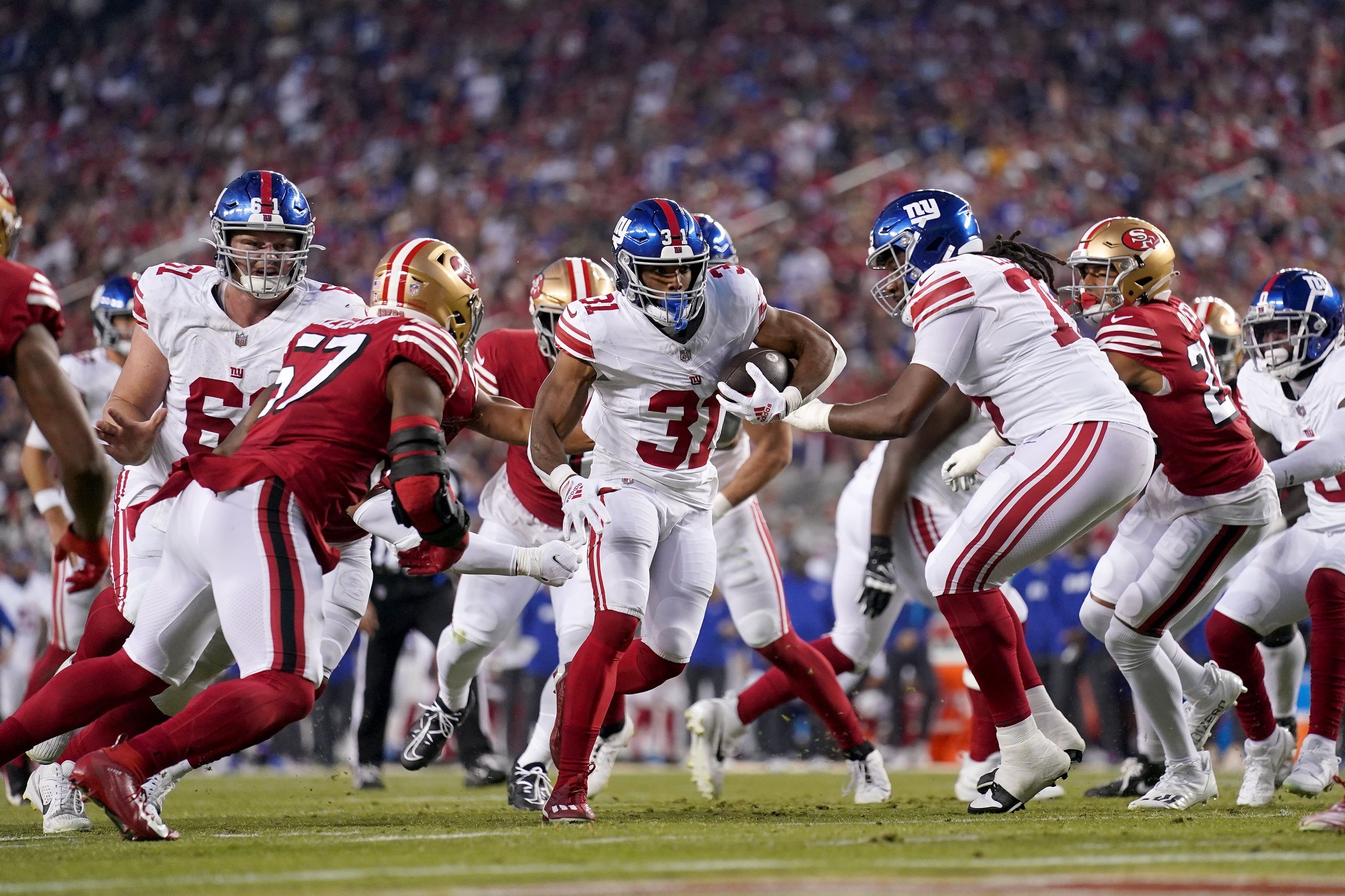 Matt Breida (31) runs for a touchdown against the San Francisco 49ers in the third quarter at Levi's Stadium.