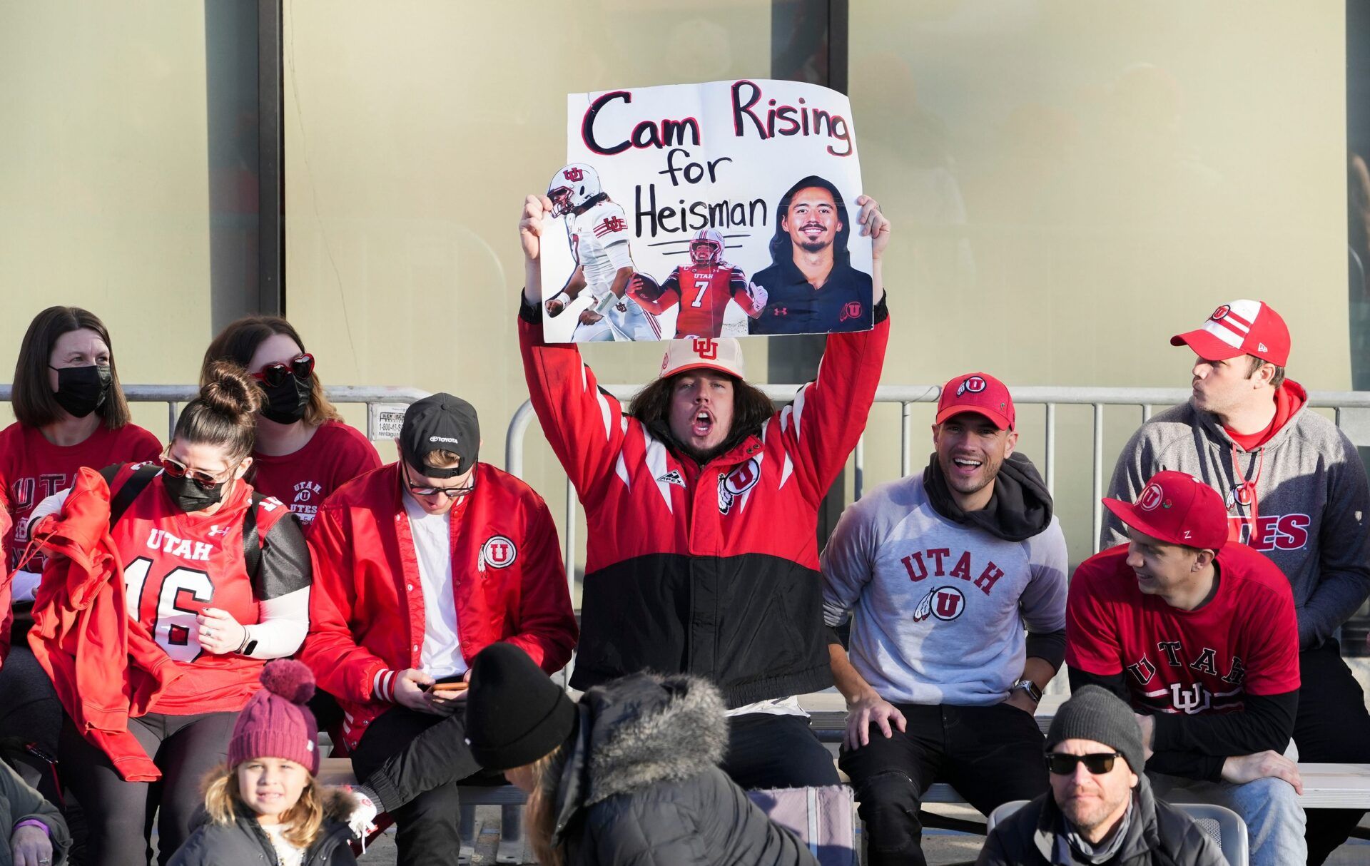 Utah fans show support for QB Cameron Rising.