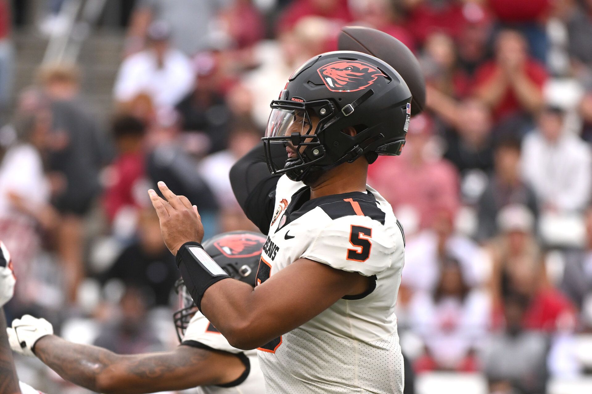 Sep 23, 2023; Pullman, Washington, USA; Oregon State Beavers quarterback DJ Uiagalelei (5) throws a pass against the Washington State Cougars in the first half at Gesa Field at Martin Stadium.