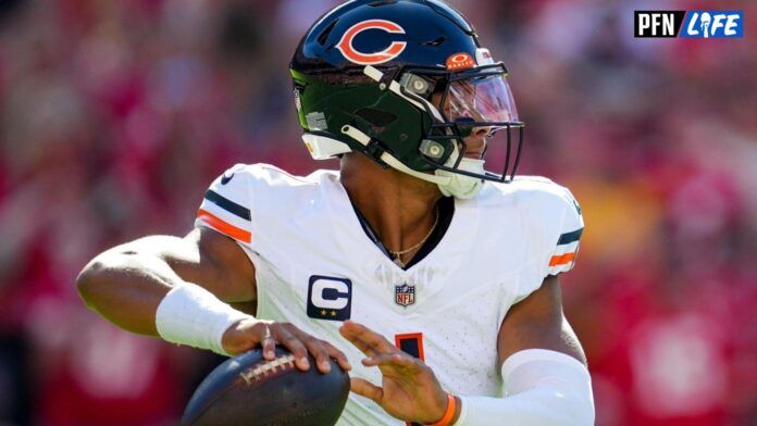 Justin Fields (1) throws a pass during the first half against the Kansas City Chiefs at GEHA Field at Arrowhead Stadium.