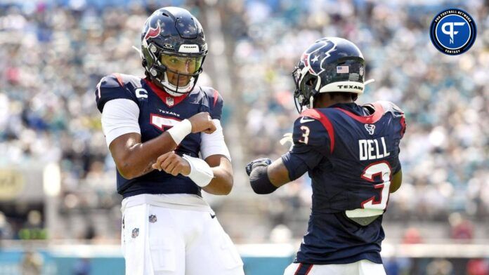 Houston Texans quarterback CJ Stroud (7) celebrates a touchdown with wide receiver Tank Dell (3) during the first half against the Jacksonville Jaguars at EverBank Stadium.