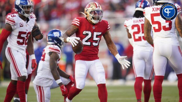 Elijah Mitchell (25) reacts after rushing for a first down against the New York Giants in the second quarter at Levi's Stadium.