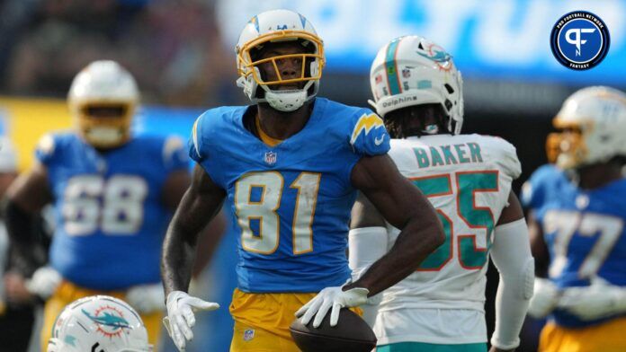 Mike Williams (81) reacts after a first down against the Miami Dolphins in the second half at SoFi Stadium.