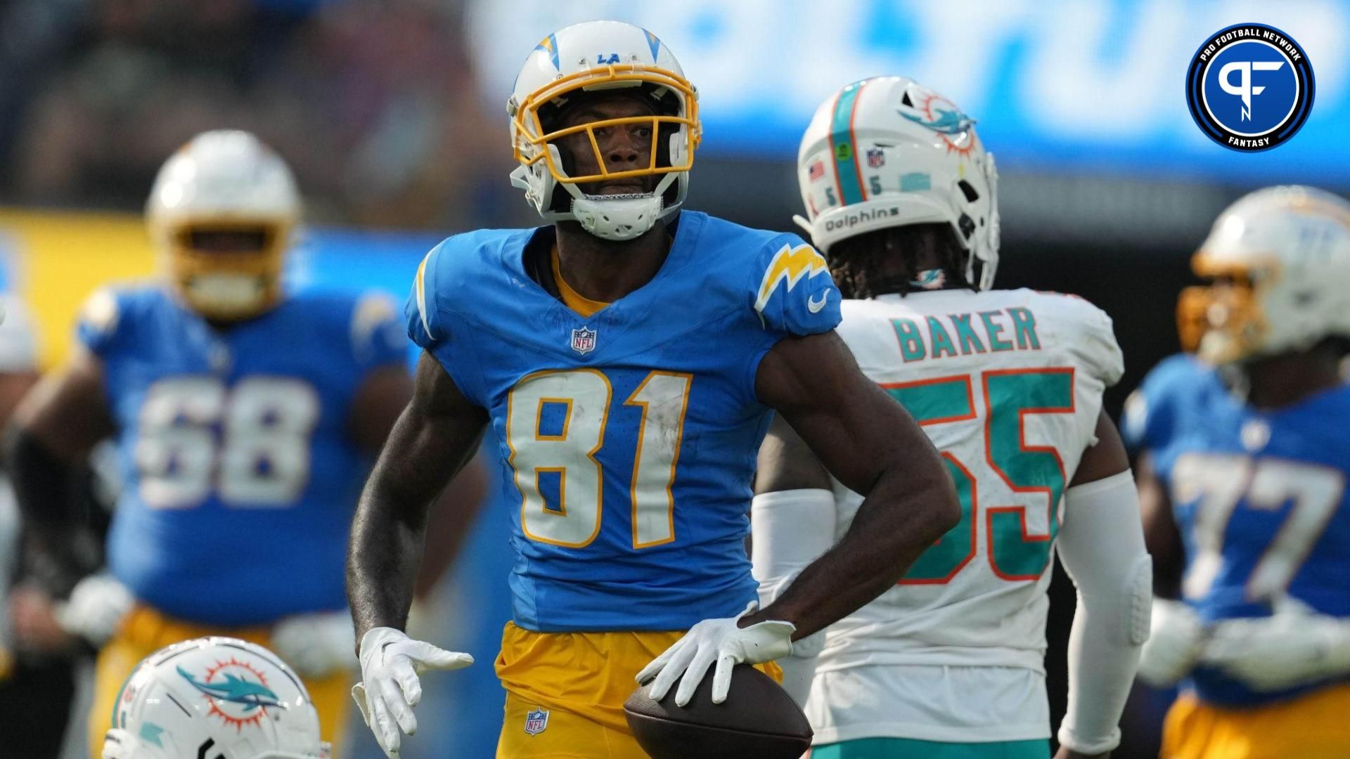 Mike Williams (81) reacts after a first down against the Miami Dolphins in the second half at SoFi Stadium.