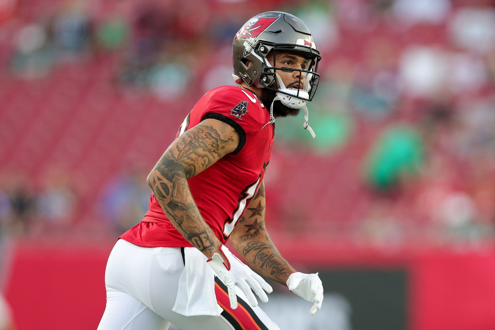 Tampa Bay Buccaneers wide receiver Mike Evans (13) warms up before a game against the Philadelphia Eagles at Raymond James Stadium.