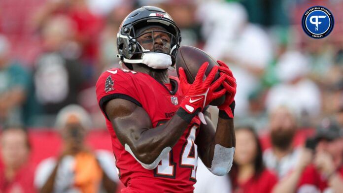 Tampa Bay Buccaneers wide receiver Chris Godwin (14) warms up before a game against the Philadelphia Eagles at Raymond James Stadium.