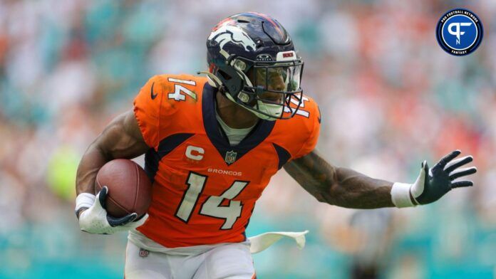 Denver Broncos wide receiver Courtland Sutton (14) runs with the ball against the Miami Dolphins in the third quarter at Hard Rock Stadium.