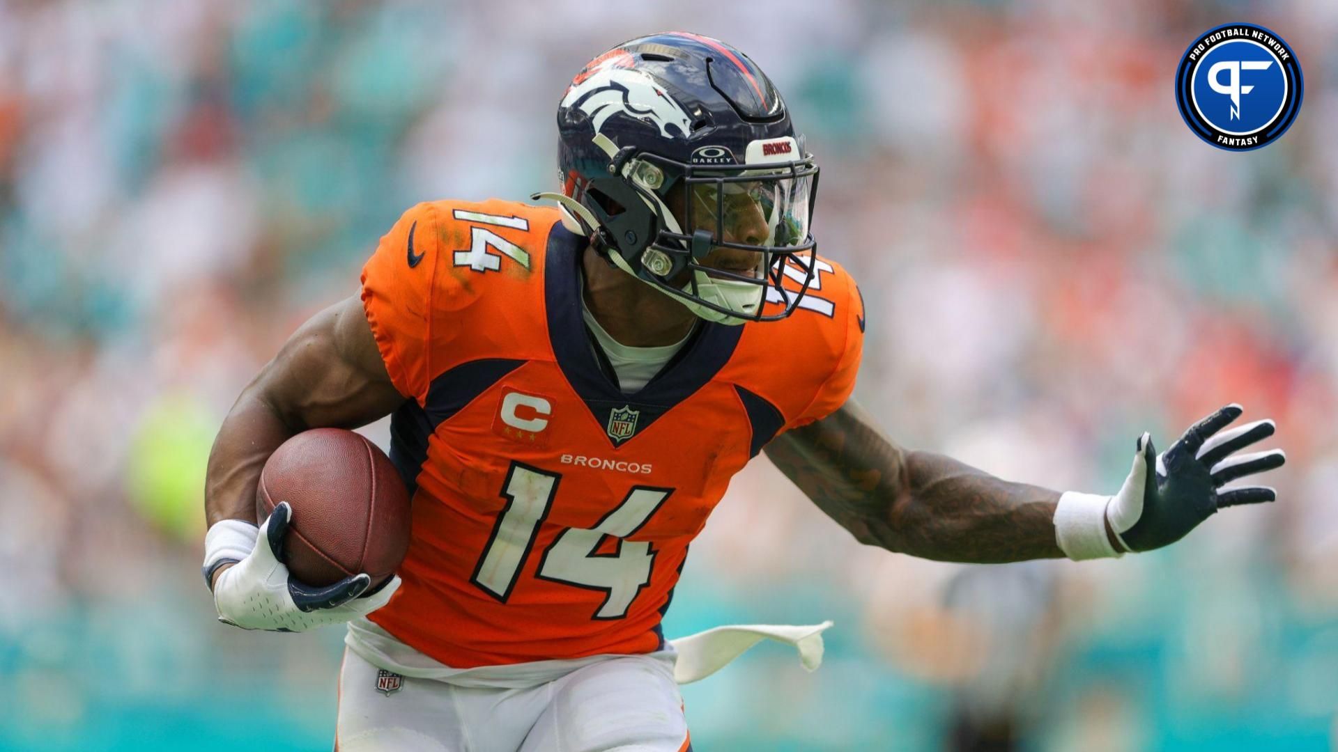 Denver Broncos wide receiver Courtland Sutton (14) runs with the ball against the Miami Dolphins in the third quarter at Hard Rock Stadium.
