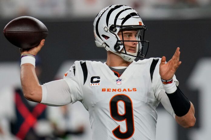 Sep 25, 2023; Cincinnati, Ohio, USA; Cincinnati Bengals quarterback Joe Burrow (9) throws a pass in the first quarter of the NFL Week 3 game between the Cincinnati Bengals and the Los Angeles Rams at Paycor Stadium. Mandatory Credit: Sam Greene-USA TODAY Sports