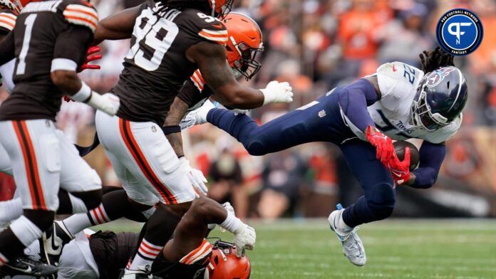 Tennessee Titans running back Derrick Henry getting tackled in a Week 3 game against the Cleveland Browns.