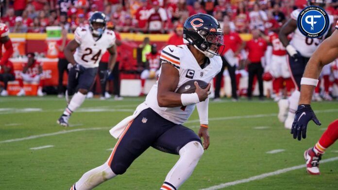 Chicago Bears quarterback Justin Fields (1) runs the ball against the Kansas City Chiefs during the second half at GEHA Field at Arrowhead Stadium.