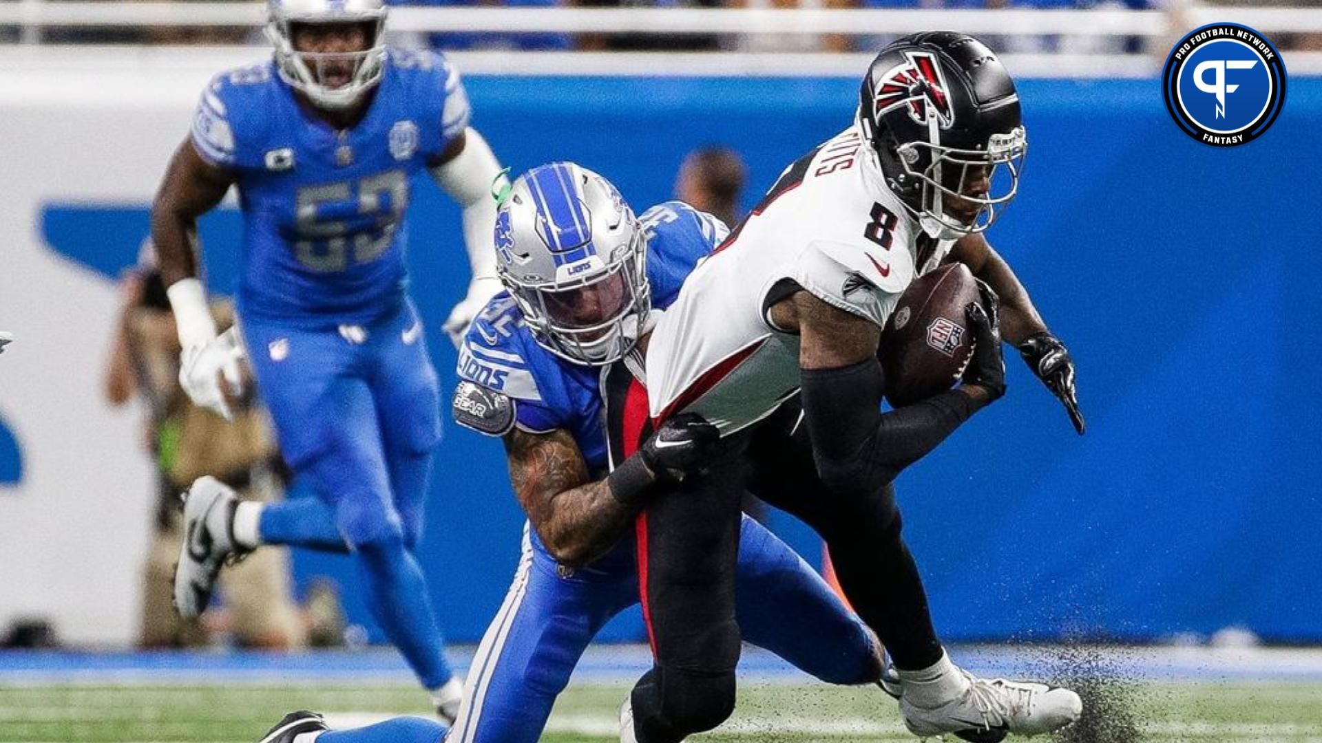 Detroit Lions safety Brian Branch (32) tackles Atlanta Falcons tight end Kyle Pitts (8) during the first half at Ford Field in Detroit on Sunday, Sept. 24, 2023.