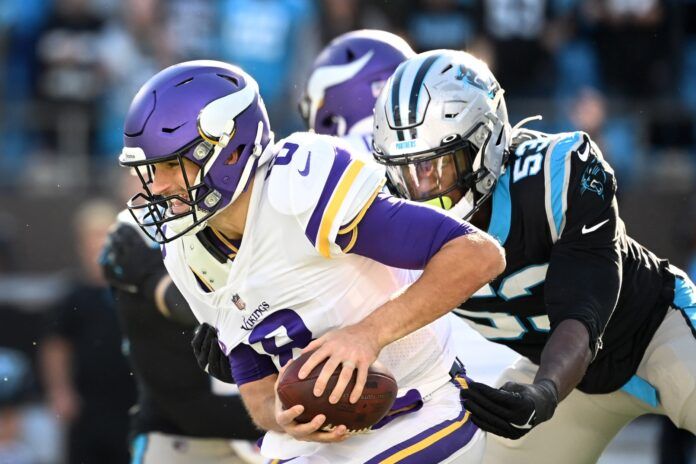 Carolina Panthers DE Brian Burns (53) sacks Minnesota Vikings QB Kirk Cousins (8).