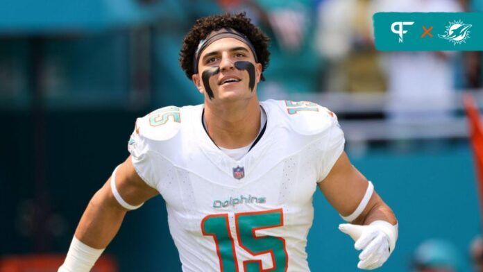 Jaelan Phillips (15) is introduced onto the field before a game against the Denver Broncos at Hard Rock Stadium.