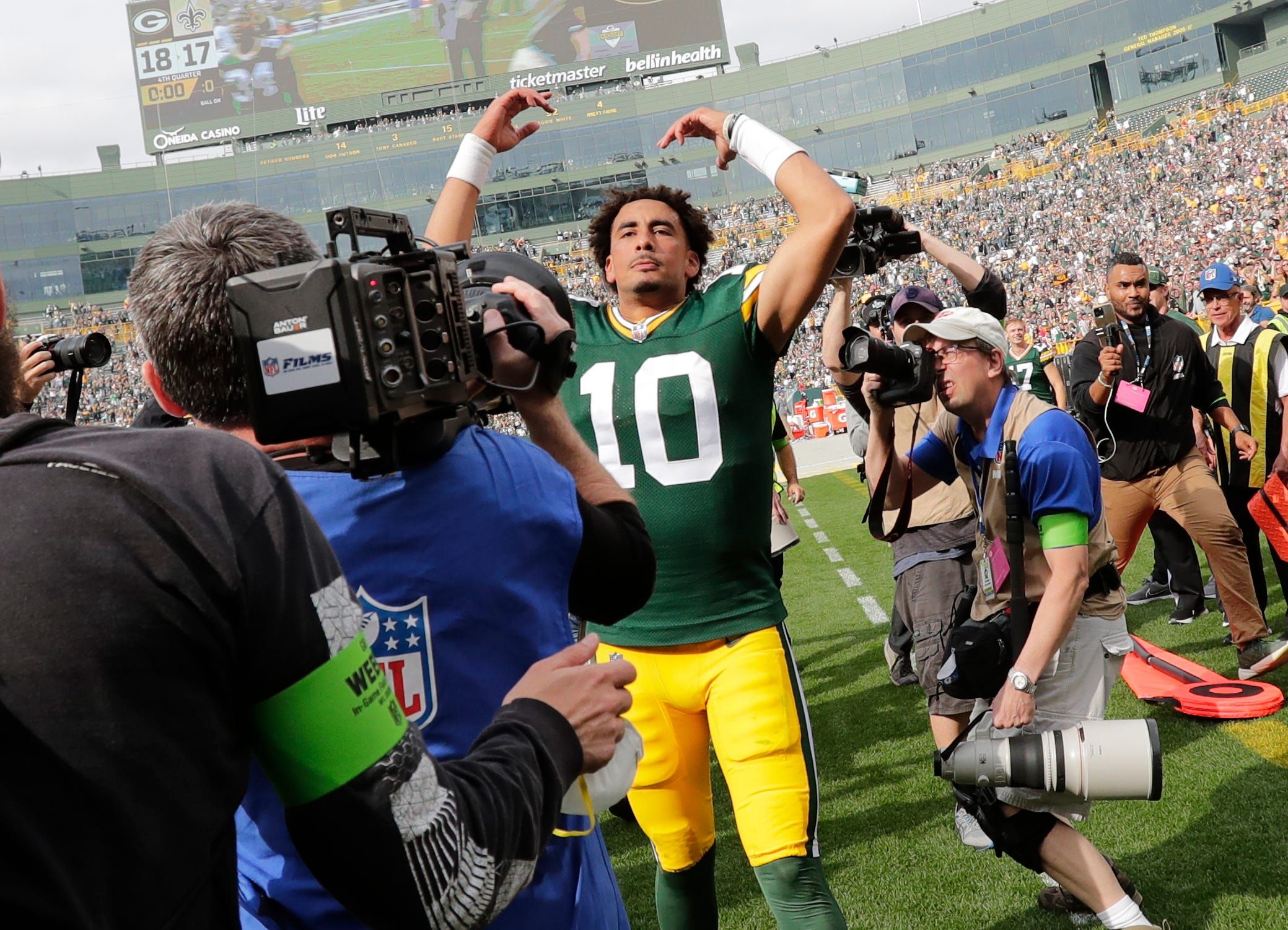 Green Bay Packers quarterback Jordan Love (10) celebrates defeating the New Orleans Saints during their football game Sunday, September 24, 2023, at Lambeau Field in Green Bay, Wis.