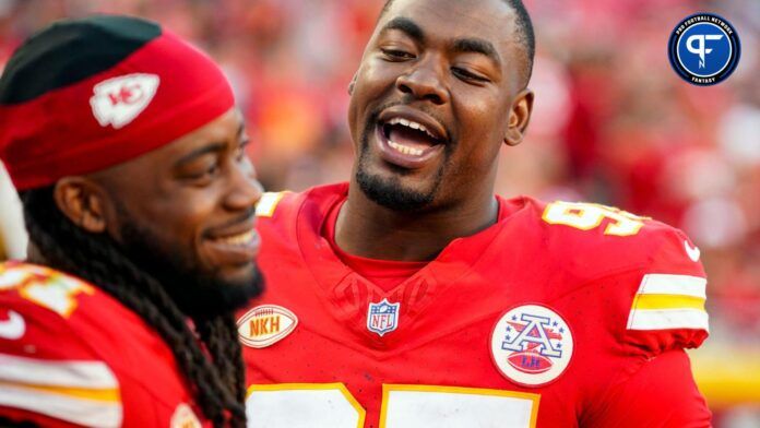 Kansas City Chiefs defensive tackle Chris Jones (95) talks with defensive end Mike Danna (51) during the second half against the Chicago Bears at GEHA Field at Arrowhead Stadium.