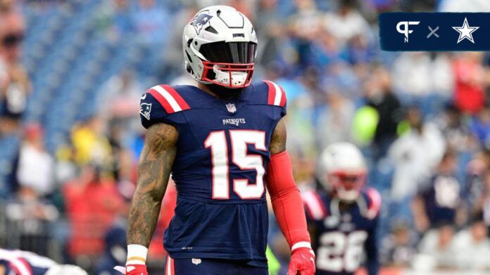 Ezekiel Elliott (15) prepares for a game against the Philadelphia Eagles during the warm-up period at Gillette Stadium.