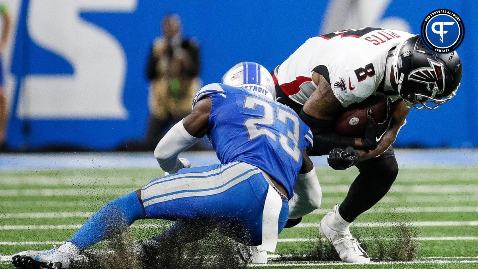 Atlanta Falcons tight end tackled by Detroit Lions defensive back Jerry Jacobs.