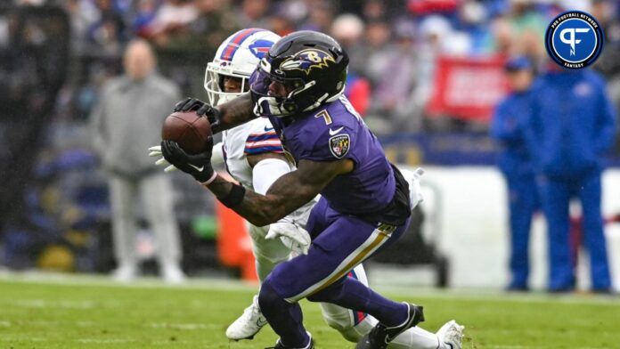 Baltimore Ravens wide receiver Rashod Bateman (7) catches a pass as Buffalo Bills safety Damar Hamlin (3) defends during the second quarter at M&T Bank Stadium.