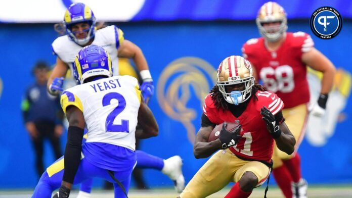 San Francisco 49ers WR Brandon Aiyuk (11) runs the ball against the Los Angeles Rams.