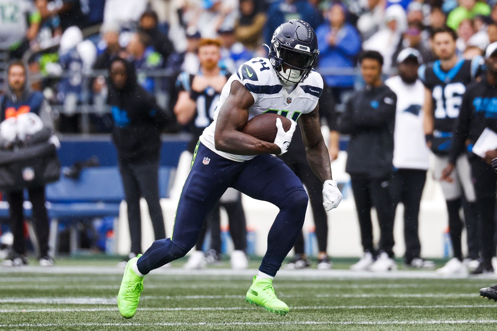 DK Metcalf (14) runs for yards after the catch against the Carolina Panthers during the second quarter at Lumen Field.