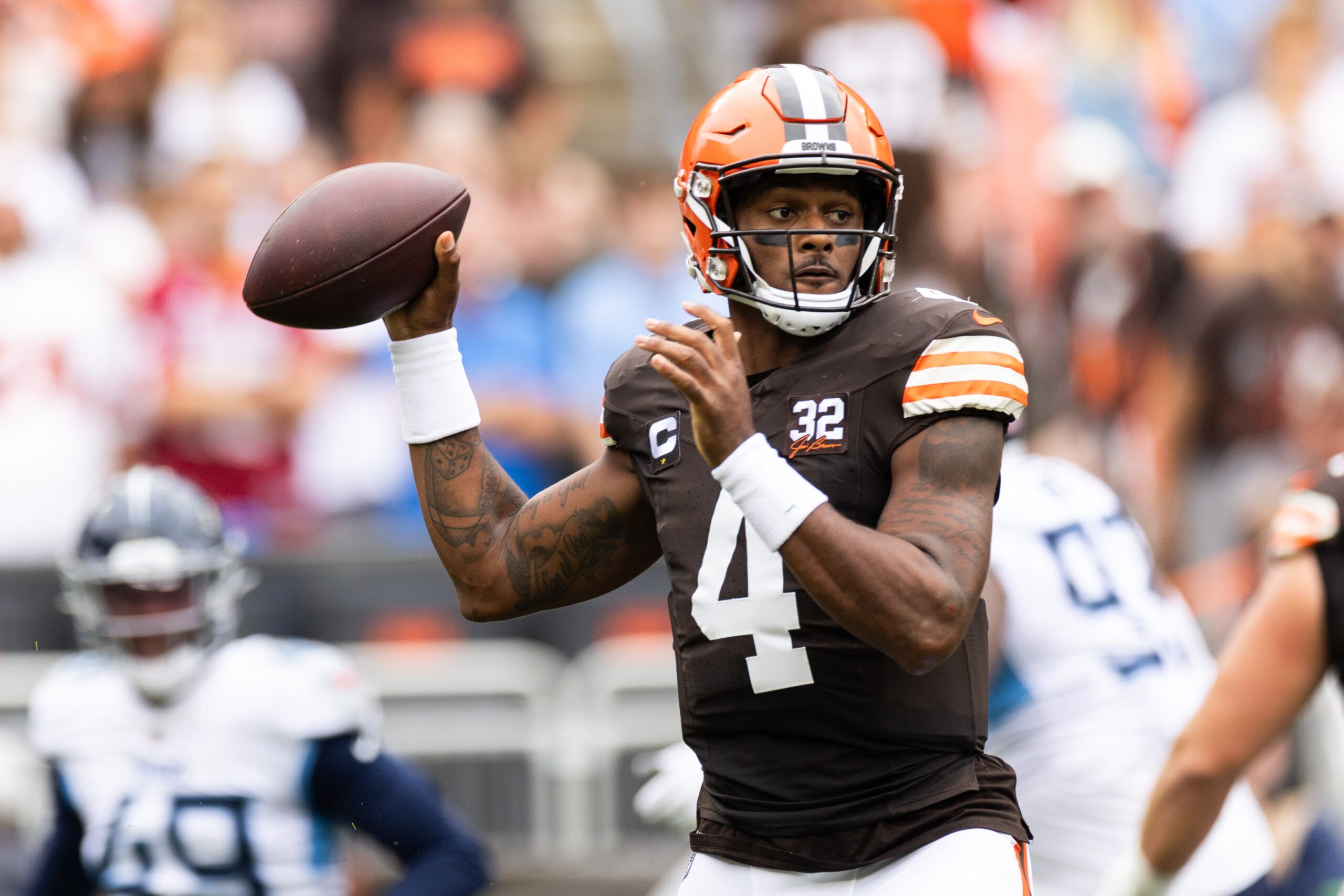 Sep 24, 2023; Cleveland, Ohio, USA; Cleveland Browns quarterback Deshaun Watson (4) throws the ball against the Tennessee Titans during the first quarter at Cleveland Browns Stadium.