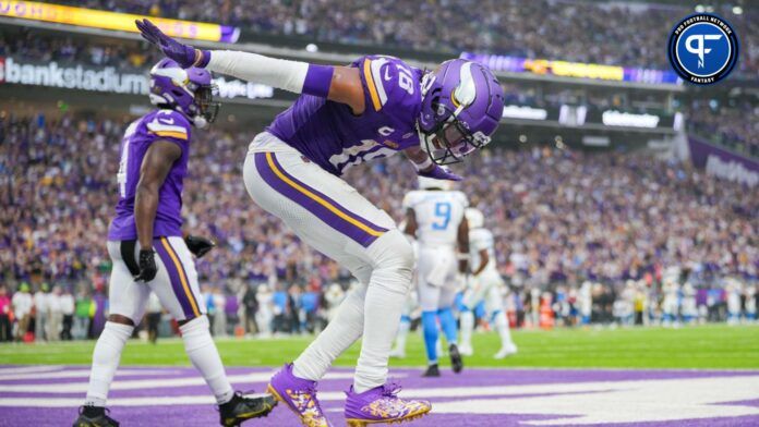 Minnesota Vikings wide receiver Justin Jefferson (18) celebrates his touchdown against the Los Angeles Chargers in the fourth quarter at U.S. Bank Stadium.