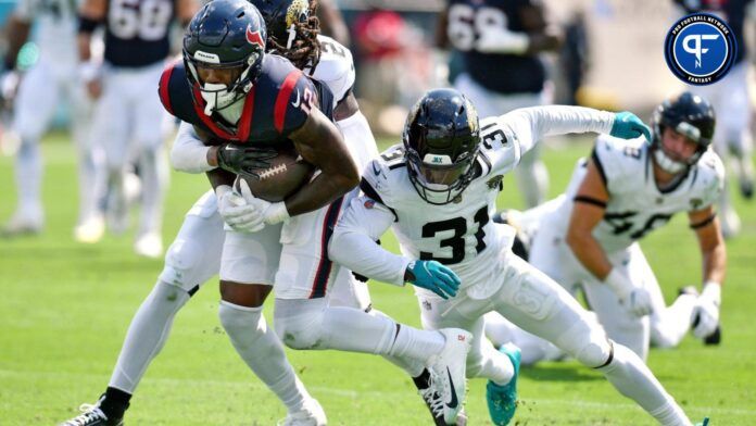 Houston Texans wide receiver Nico Collins achieves a new set of downs against the Jacksonville Jaguars.