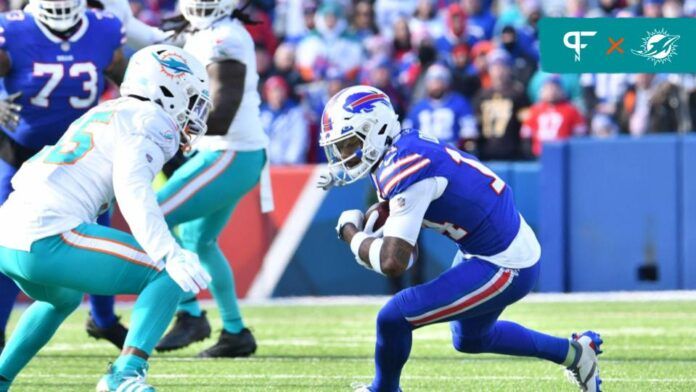 Buffalo Bills WR Stefon Diggs (14) looks to run after the catch against the Miami Dolphins.