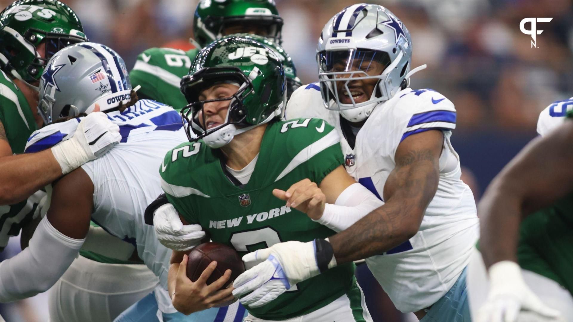 Zach Wilson (2) is sacked by Dallas Cowboys linebacker Micah Parsons (11) in the first quarter at AT&T Stadium.