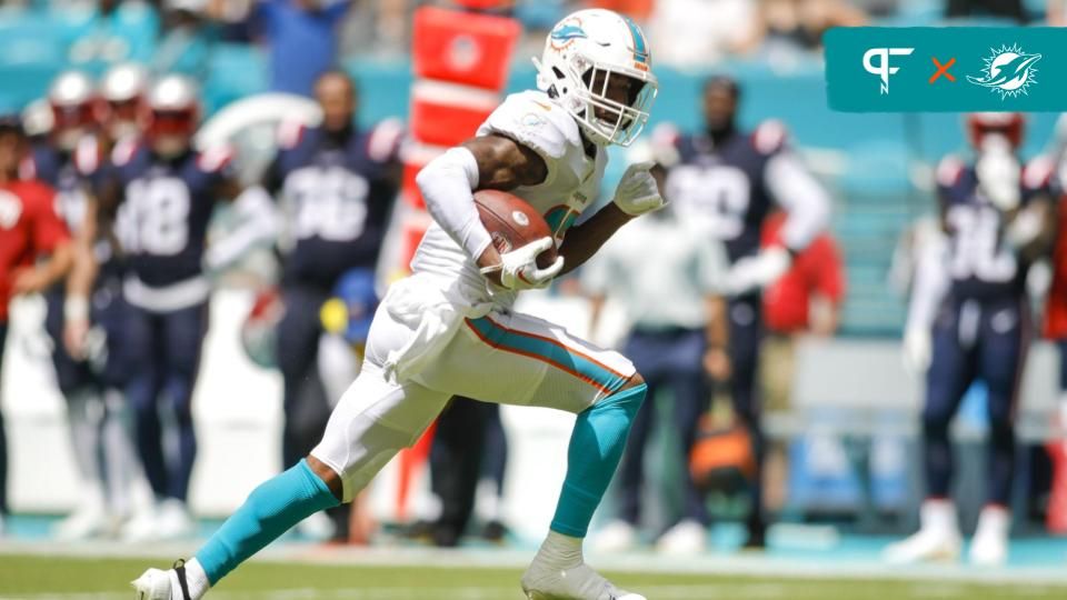 Jaylen Waddle (17) runs for a touchdown during the second quarter against the New England Patriots at Hard Rock Stadium.